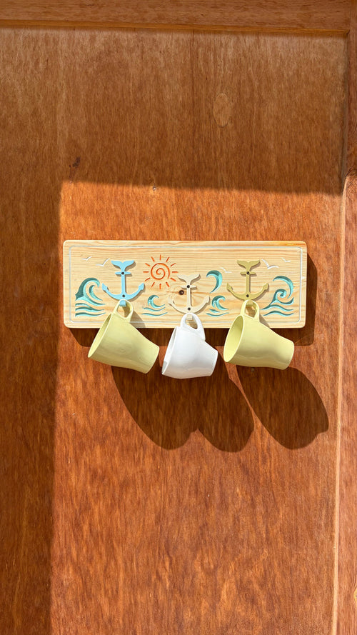 Bahr Rise&Tide holder with sleek design, featuring a modern ceramic and wood combination for stylish storage.