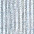 A close up of a beautifully hand block printed John Robshaw Aleppo Light Indigo Fabric showcasing exquisite craftsmanship.