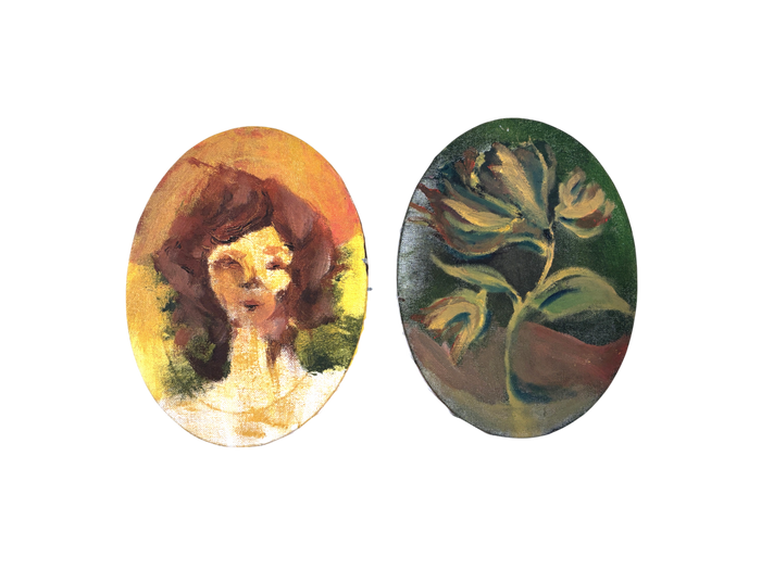 Half painted oval canvases