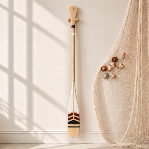 Bahr Ruby Tide paddle with ergonomic handle and vibrant red color, designed for stand-up paddleboarding.