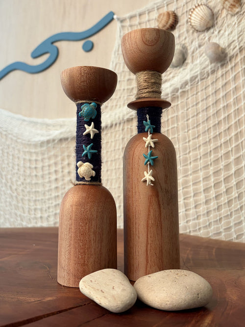 Set of Bahr Starfish Light Candles featuring starfish-shaped candle holders with lit candles for decorative ambiance